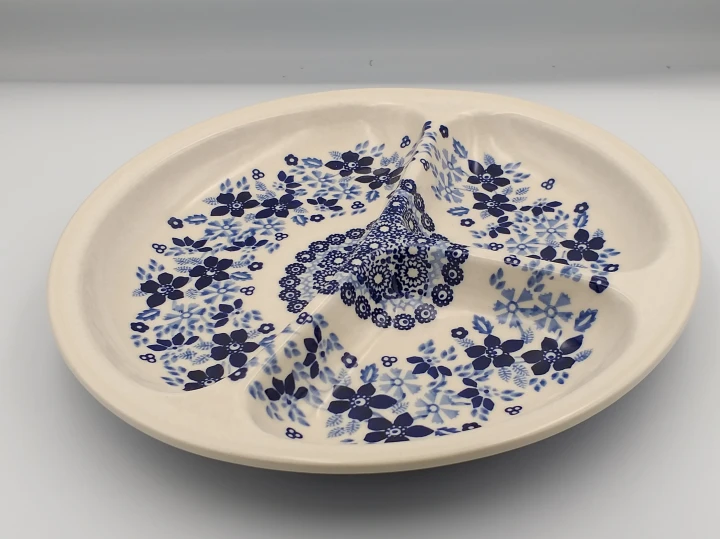 27577